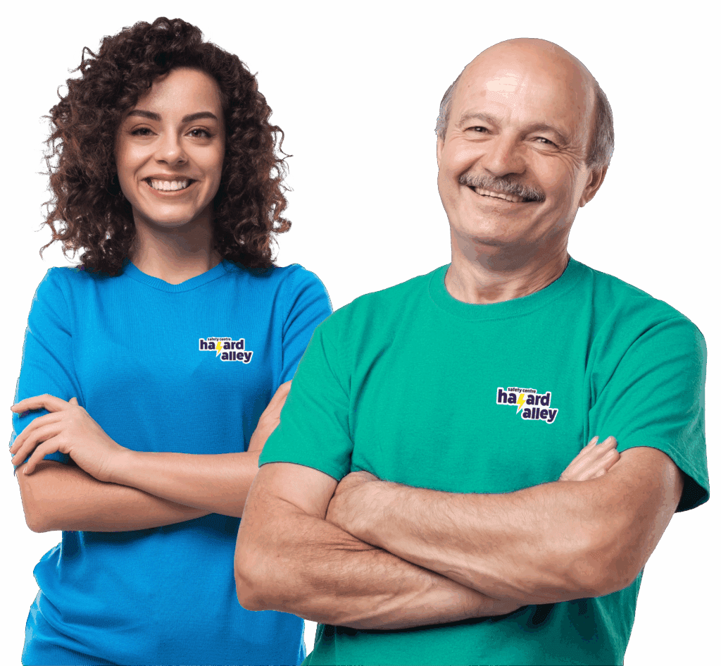 Two Hazard Alley volunteers posing cheerfully